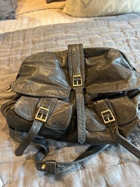 BULGA Black Leather Crossbody Backpack with Gold Buckles